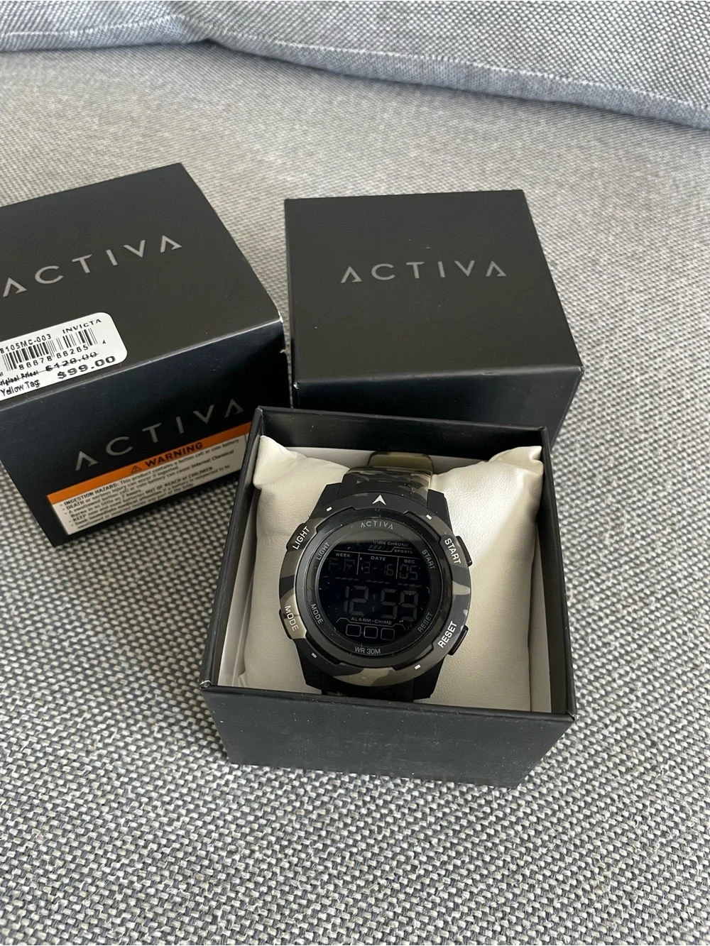 Activa X Terrain digital watch, featuring camouflage pattern and 45mm case.